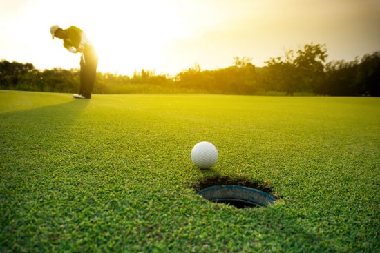 Golf put on green