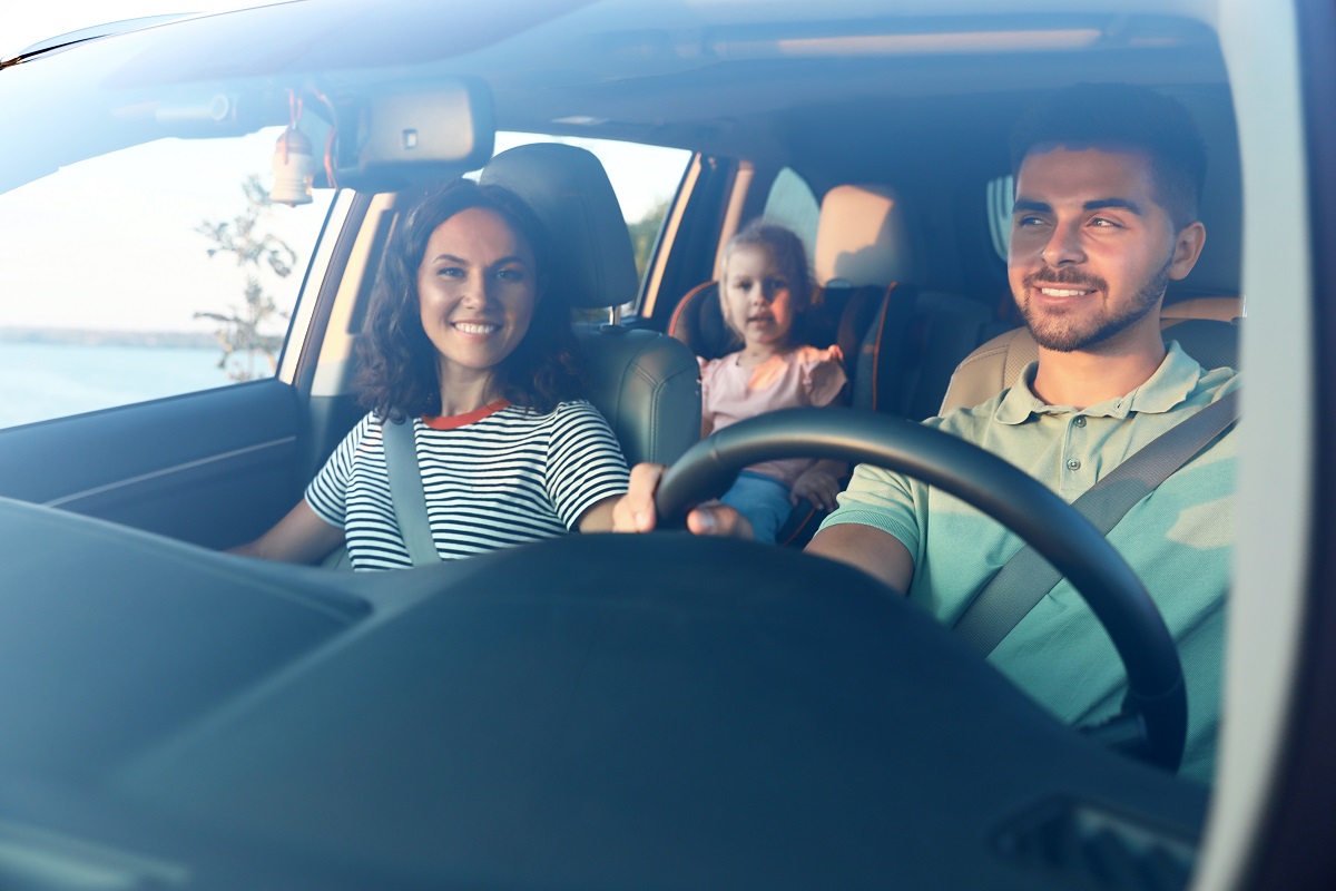 Family driving car on holiday