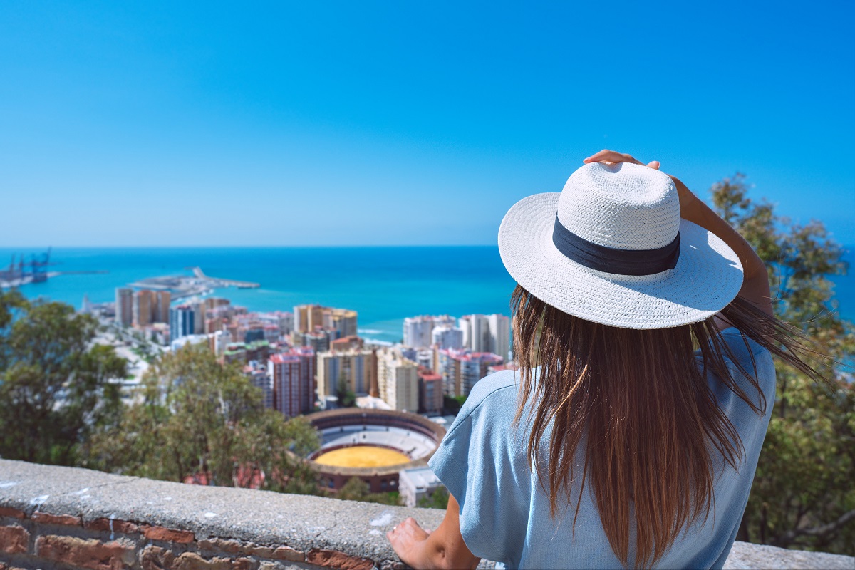 Woman looking down at Malaga