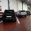 A row of rental cars available for hire at Helle Hollis.