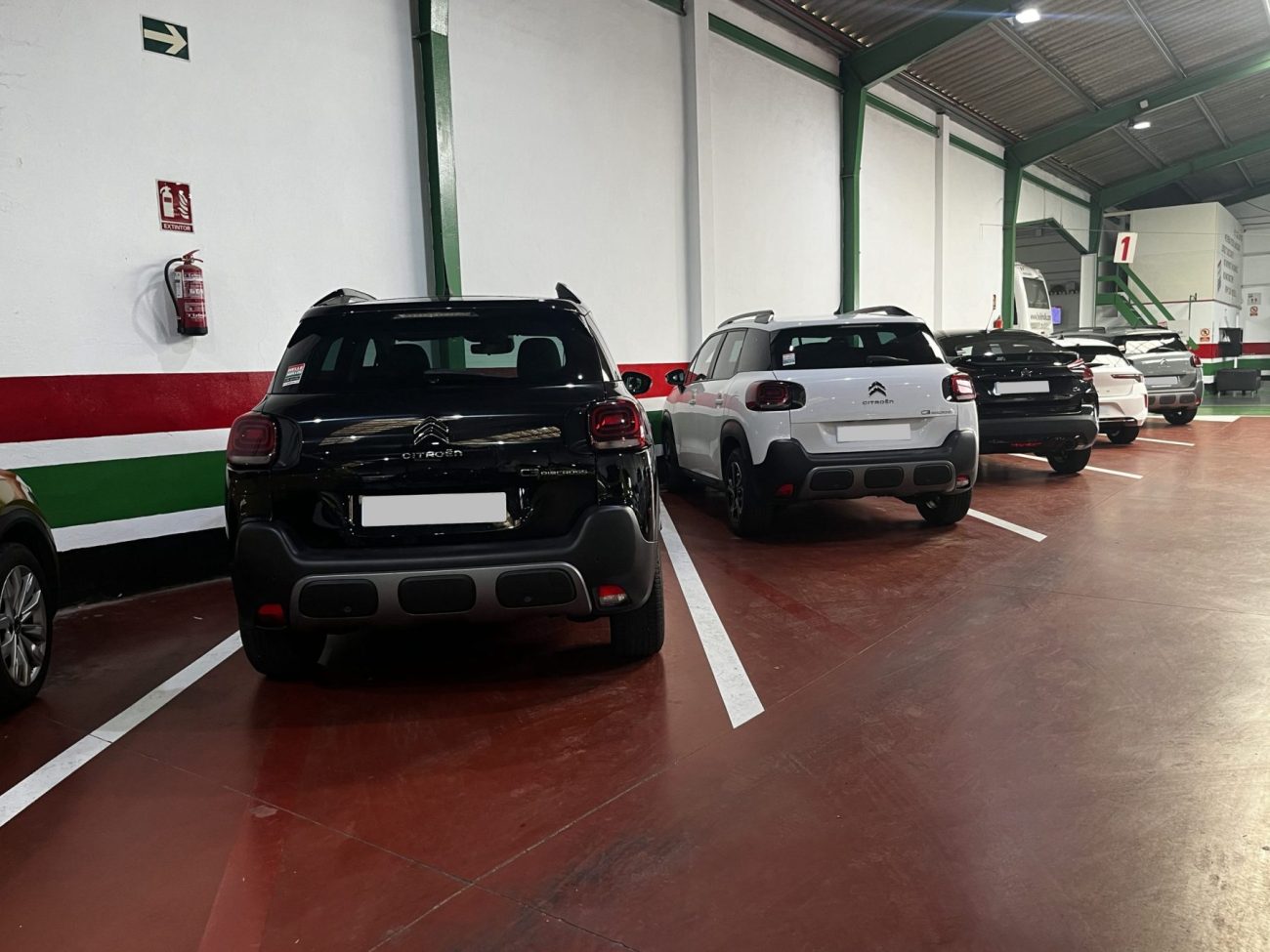 A row of rental cars available for hire at Helle Hollis.